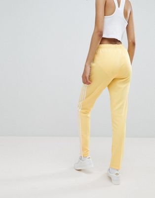 yellow adidas pants