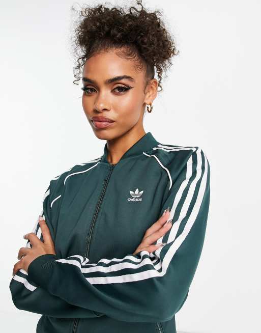 a tiempo La playa oscuridad adidas Originals adicolor three stripe track top in dark green | ASOS