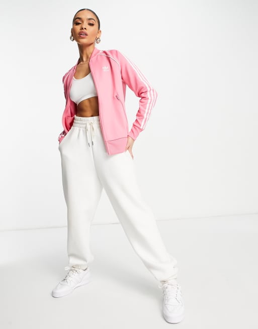 Adidas originals adicolor three stripe track jacket in pink top