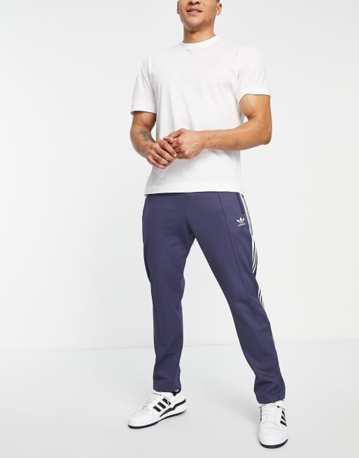 adidas Originals adicolor three stripe tracksuit bottoms in navy