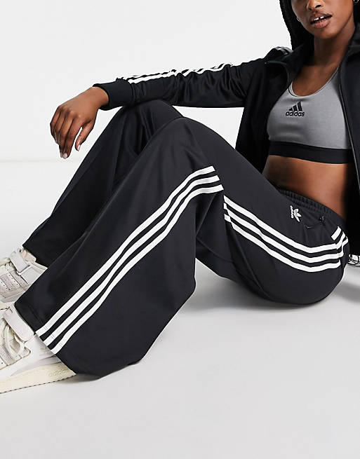 adidas Originals adicolor three stripe wide leg track pants in black | ASOS