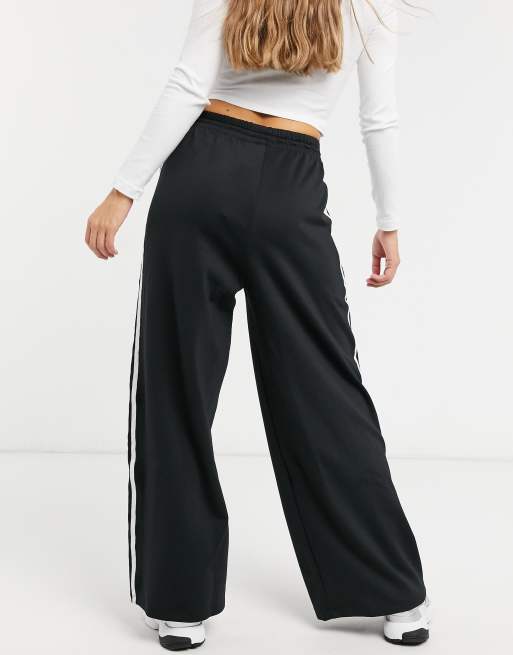 adidas Originals adicolor three stripe wide leg trousers in black