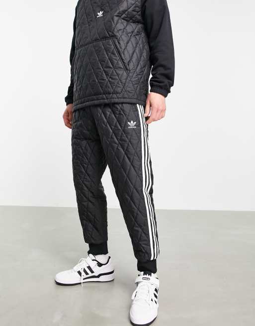 adidas Originals adicolor Three-Stripes quilted trackies in black