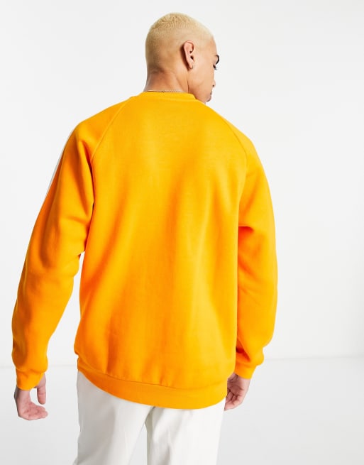 Adidas originals three best sale stripe sweatshirt in orange