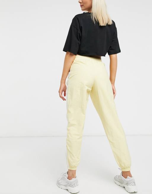 adidas originals adicolor superstar track pants yellow