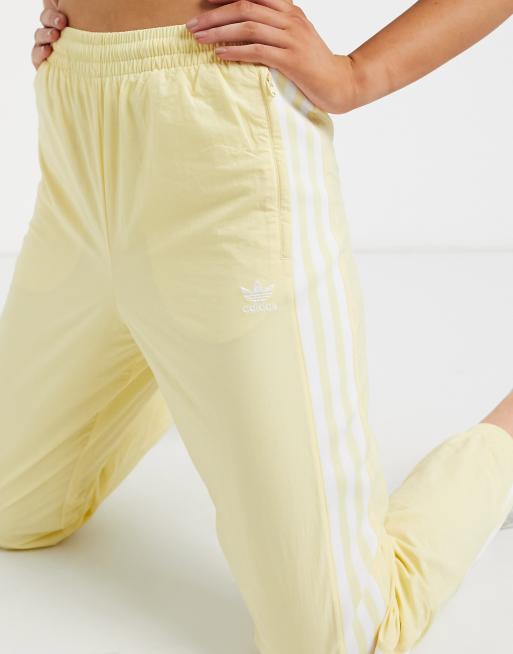 Adidas broek geel hotsell