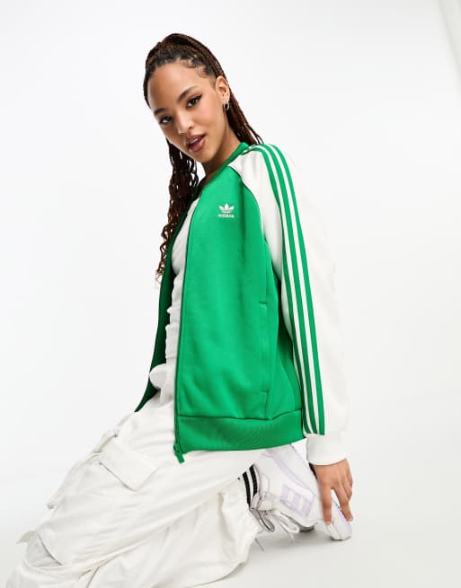 Adidas originals adicolor track jacket in green discount