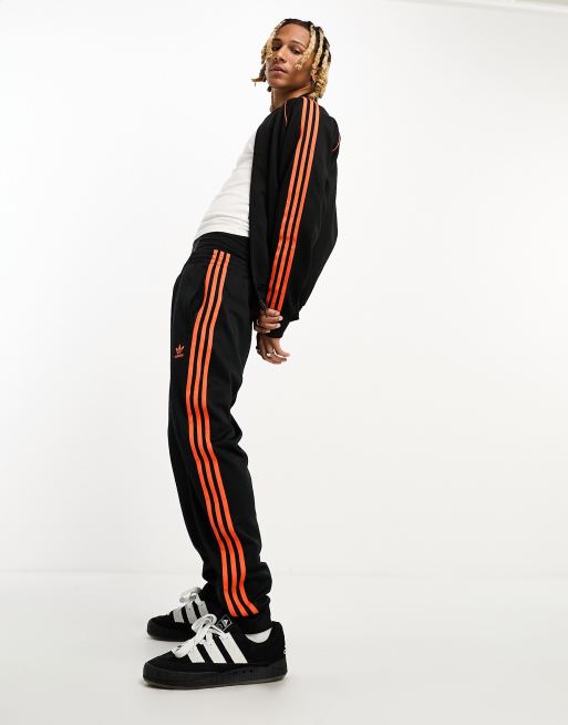 Jogging Noir/Orange Homme Adidas HE2259