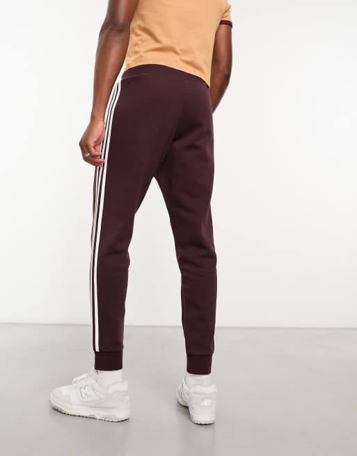 adidas Originals Adicolor tracksuit joggers in brown ASOS