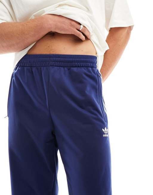 adidas Originals Adicolor tracksuit trousers in dark blue ASOS