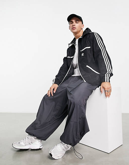 adidas Originals – adicolor – Trainingsjacke in Schwarz mit Kapuze | ASOS
