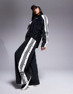 adidas Originals Adicolor velour track pants in black | ASOS