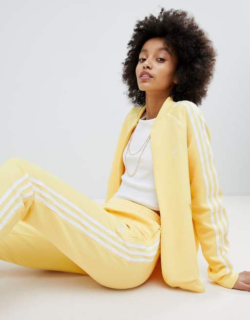 Mauve Specialist regionaal adidas Originals - adicolor - Pantalon de jogging et veste à trois bandes -  Jaune | ASOS