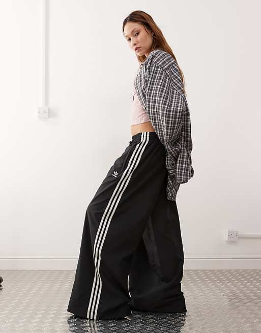 adidas Originals Adicolor wide leg track pants in black | ASOS adidas Originals Adicolor wide leg track pants in black | ASOS