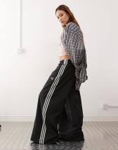 adidas Originals Adicolor wide leg track pants in red