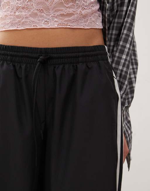 adidas Originals Adicolor wide leg track pants in black