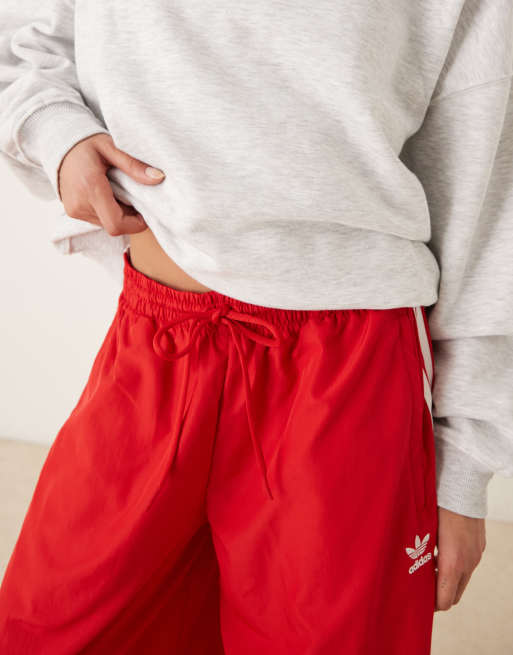 adidas Originals Adicolor wide leg track pants in red ASOS
