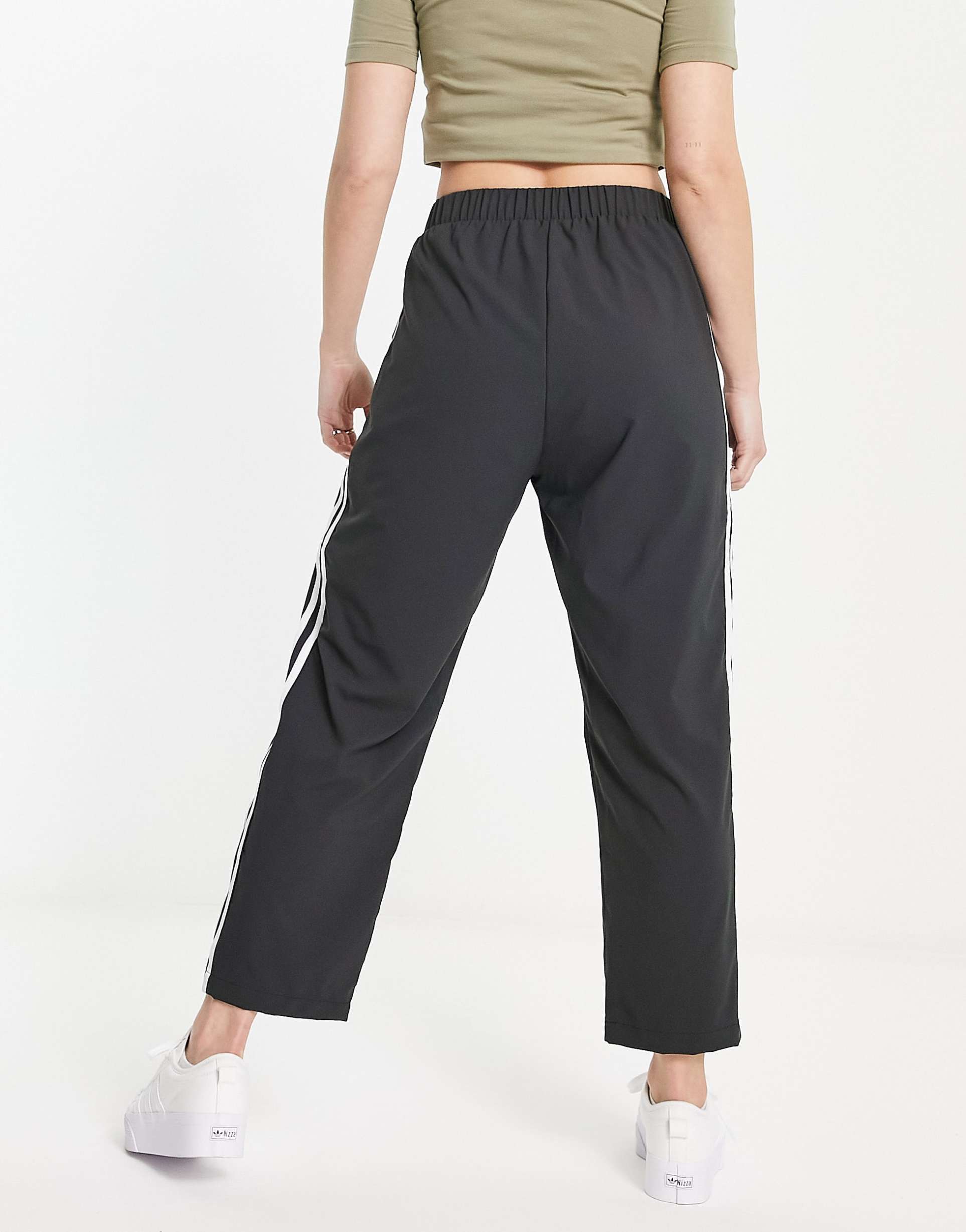 adidas Originals adicolor woven joggers in black view 3