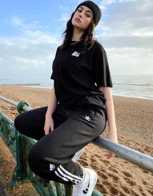 adidas originals three stripe cuffed sweat pants in black