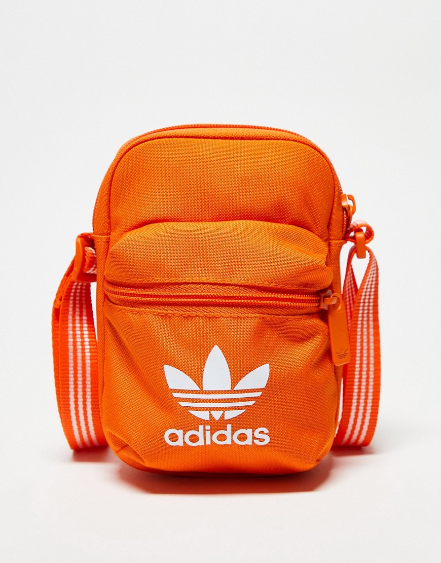 adidas Originals Adicolour festival bag in orange