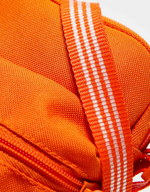 adidas Originals Adicolour festival bag in orange ASOS