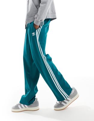 adidas Originals Adicolour oversized tracksuit bottoms in teal-Blue