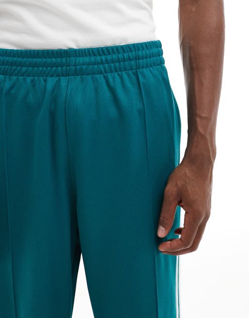 adidas Originals Adicolour oversized tracksuit bottoms in teal ASOS