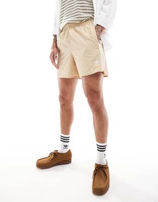 adidas Originals Adicolour sprinter shorts in beige-White