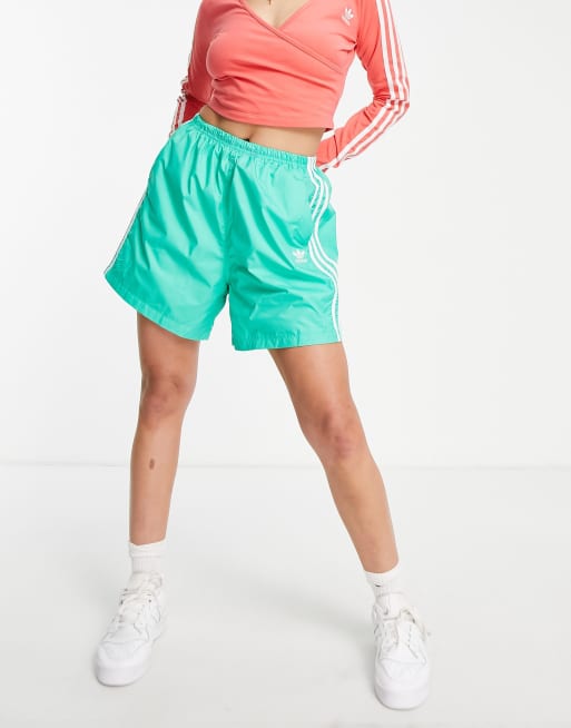 adidas Originals adicolour three stripe long shorts in green