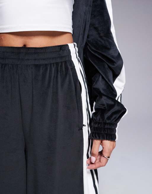 Adidas black velour track pants hotsell