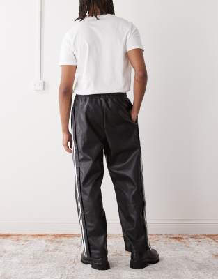 adidas Originals adidas x Jeremy Scott faux leather wide pants in