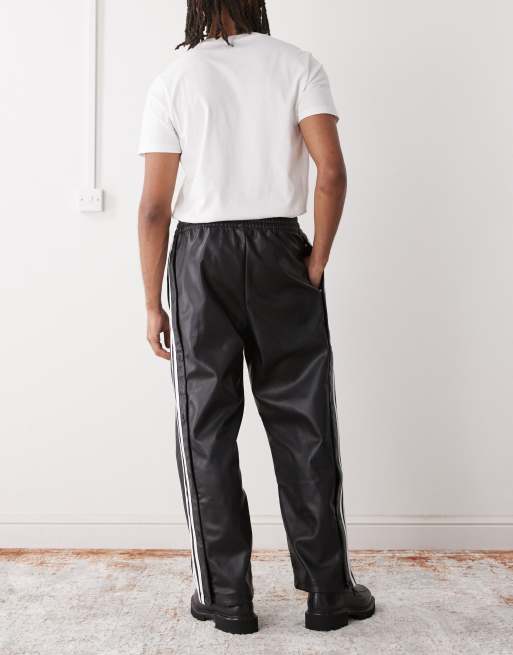 adidas Originals Adidas x jeremy scott faux leather wide pants in