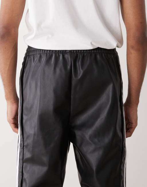 adidas Originals Adidas x jeremy scott faux leather wide pants in