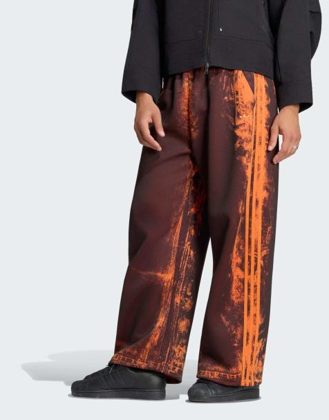 adidas Originals Adilenium 6 spacerbyxor i craft orange - view 1
