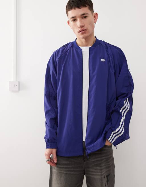 adidas Originals Adilenium Season 3 track jacket in navy | ASOS