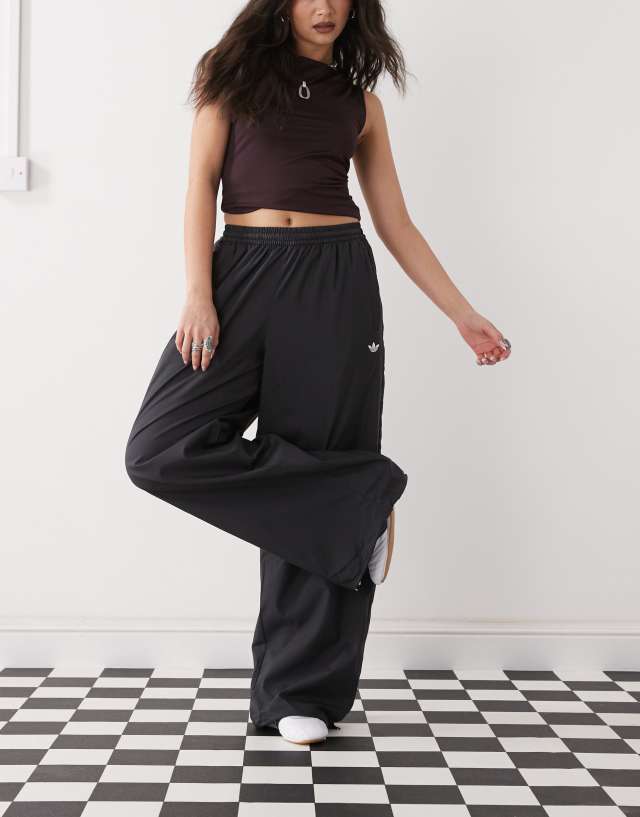 adidas Originals Adilenium Season 3 woven track pants in black | ASOS