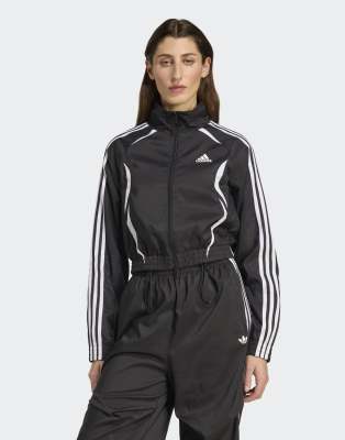 adidas Originals Adilenium season 4 teamgeist slim track top in black