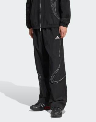 adidas Originals Adilenium season 4 teamgeist track pants in black