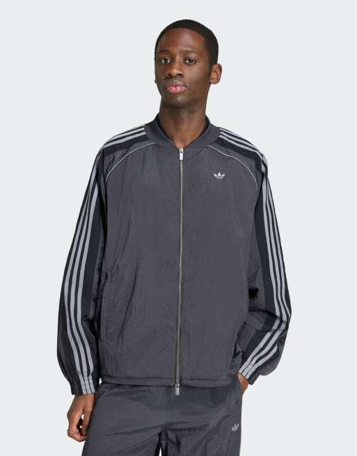 adidas Originals Adilenium season 5 track top in utility black | ASOS