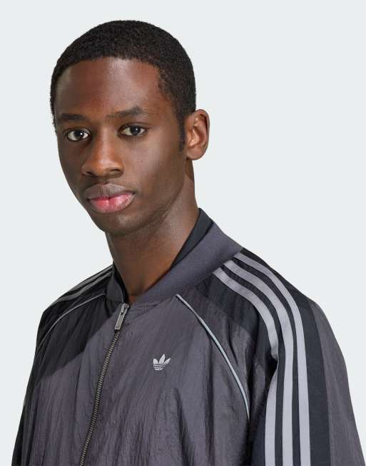 adidas Originals Adilenium season 5 track top in utility black | ASOS