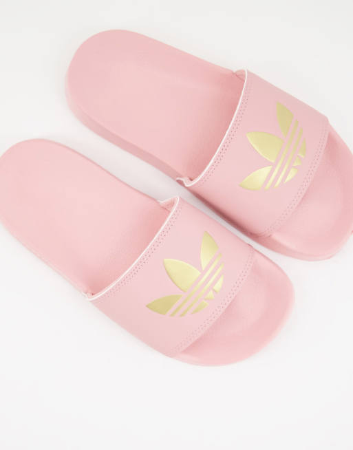 adidas Originals - Adilette lite - Sliders i lyserød med guldfarvet trekløver