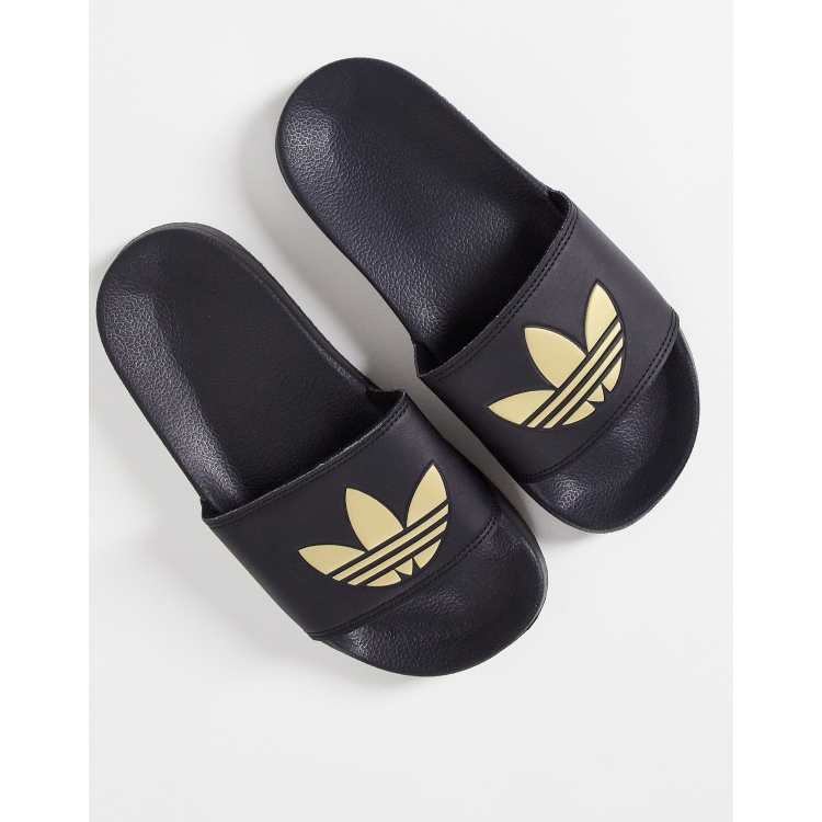 Adidas slides black and hot sale gold