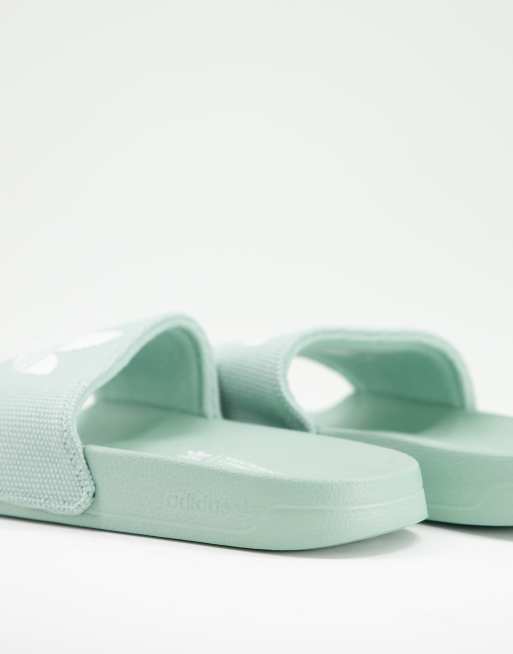 adidas Originals Adilette Lite sliders in hazy green ASOS