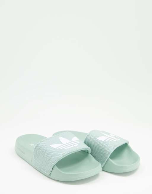 adidas Originals Adilette Lite sliders in hazy green ASOS