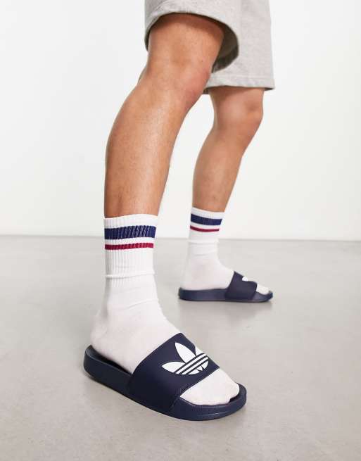 adidas Originals adilette Lite sliders in navy ASOS