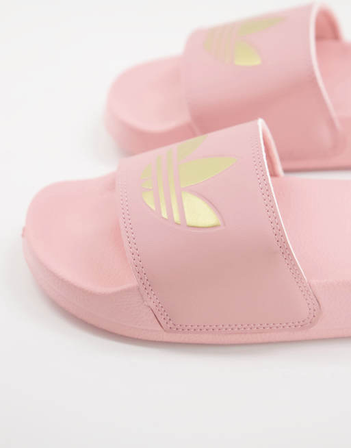 adidas Originals Adilette lite sliders in pink with gold trefoil ASOS