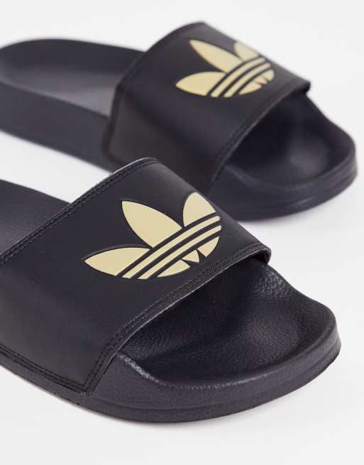 Adidas adilette oro top