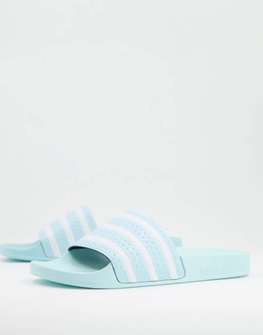 adidas Originals – Adilette – Ljusblå tofflor
