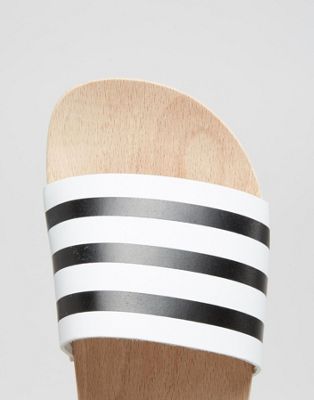 adidas Originals - Adilette - Sandali piatti con suola di legno e fascia |  ASOS
