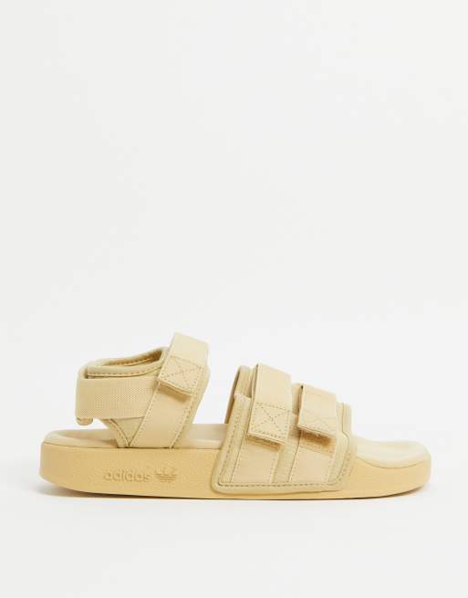 Beige adidas slides online